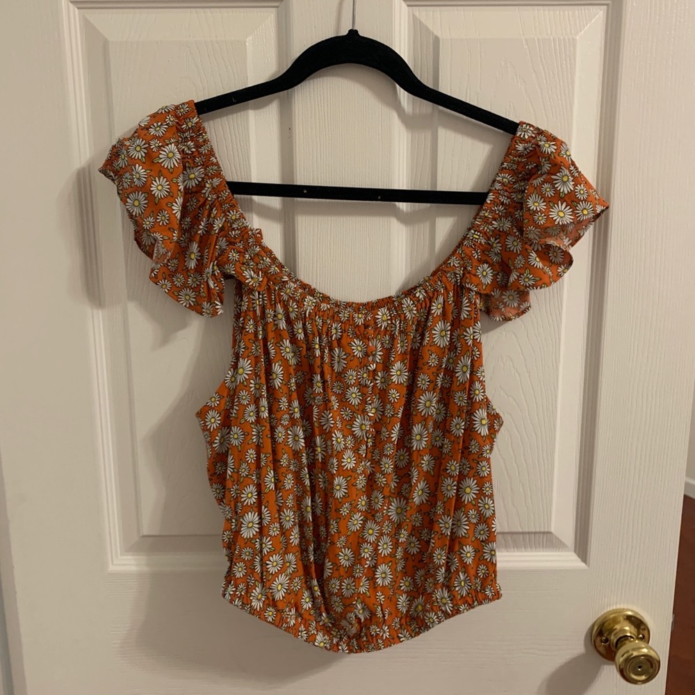 Orange crop top with daisies